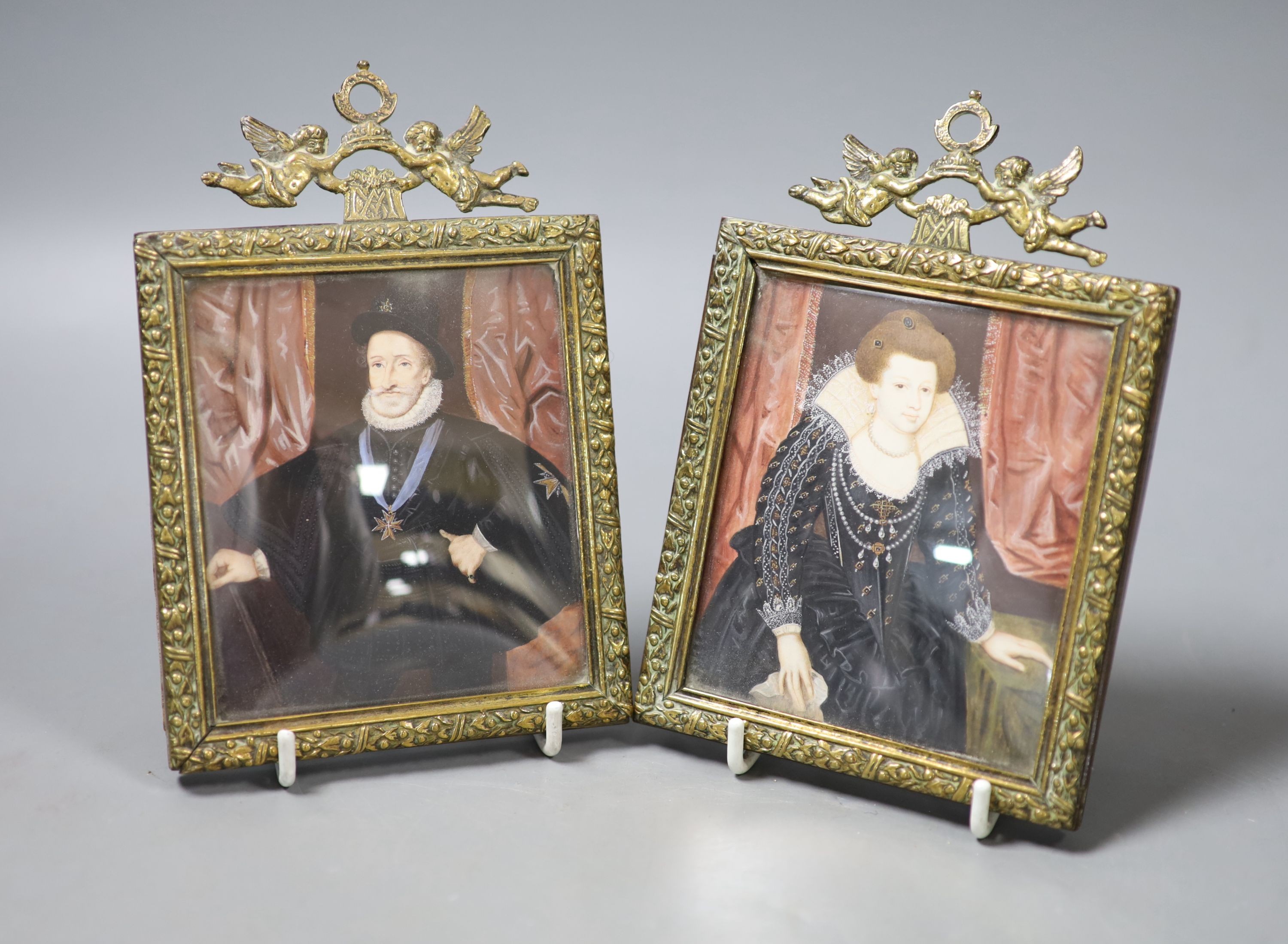 A pair of 19th century brass portrait miniatures on ivory of Henry V of France and Mary De Medici of Tuscany, both 10cm
